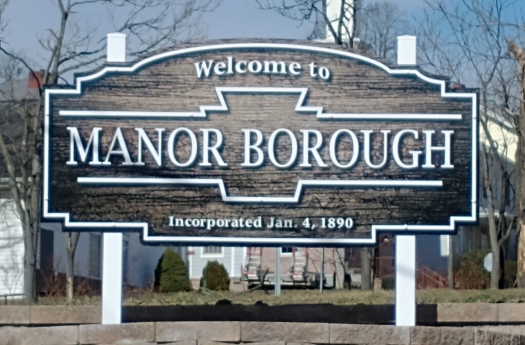 sign welcoming you to Manor Borough